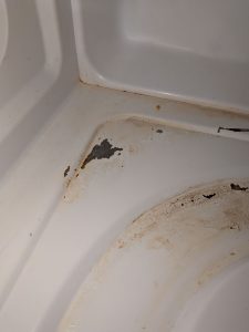 Bubbling and peeling microwave cavity coating linked to sparking